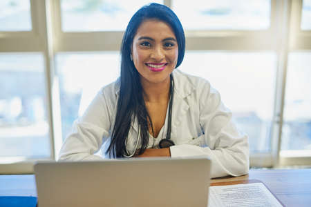 Researching to ensure she gets the diagnosis right. Portrait of a female doctor working on a laptop...