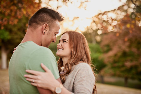 Love is in the eyes. Shot of an affectionate young couple spending a day outdoors.