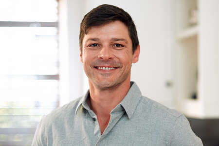This smile means that the weekend is here. Closeup shot of a man smiling while spending the day...