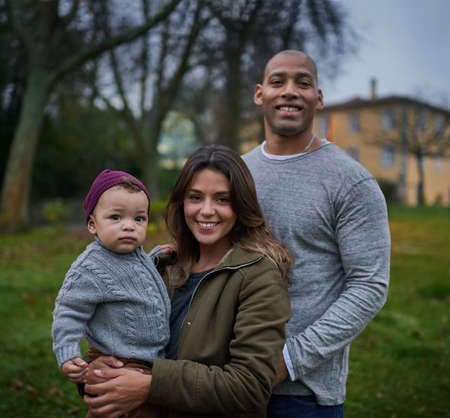Hes little but hes brought the most joy into our lives. Portrait of a mother and a father bonding...