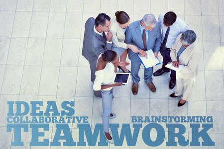 Teamwork makes the dream work. A graphic illustration depicting teamwork in business.の写真素材