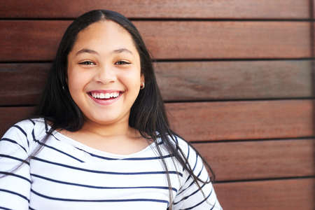 The most important thing a girl wears is her confidence. Portrait of a happy and confident young...