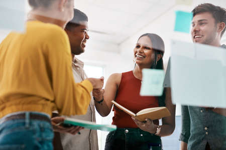 Our collaboration works because our skills complement each other. Shot of businesspeople shaking...