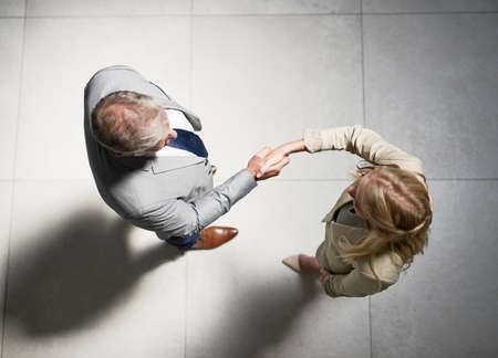 Together theyll discover many exciting business opportunities. High angle shot of two businesspeople...