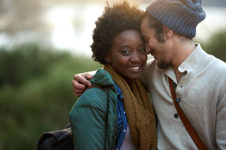 College life. Cropped shot of an affectionate young couple on campus.の写真素材