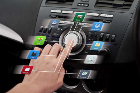 Access to your applications wherever you go. Closeup shot of a driver accessing digital applications...