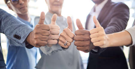 Theres always success at the end of hard work. Closeup shot of a group of unrecognisable...