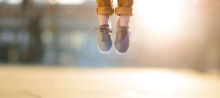 Let the happiness lift you. Shot of a man jumping in joy mid air.の写真素材