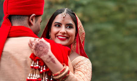 I married my king. Cropped shot of a young hindu couple on their wedding day.