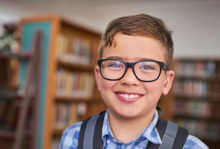 Youre looking at one of tomorrows leaders. Portrait of a young boy at school.の写真素材