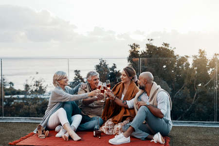Heres to many more new years celebrations together. Full length shot of an affectionate family...