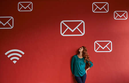 So many messages floating around in the atmosphere. Shot of a young woman surrounded by messaging...
