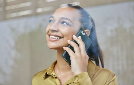 Il have to think about that.... Cropped shot of an attractive young businesswoman making a phonecall...