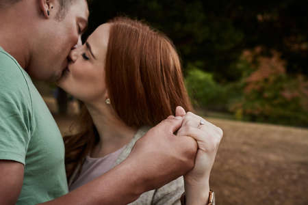 Love, the greatest gift of life. Shot of an affectionate young couple spending a day outdoors.の写真素材