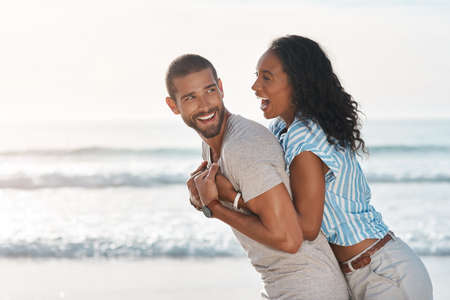 Spending a bright day engulfed in love. Shot of a young couple enjoying some quality time together...