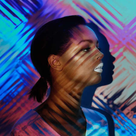 Life in full colour. Digitally enhanced shot of a beautiful nude woman posing alone in studio.