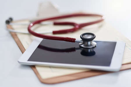 Its important to log your medical history with your practitioner. Cropped shot of a stethoscope on a...