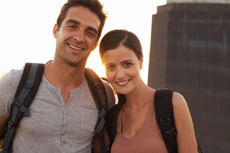 Backpacking Making memories and seeing the world. Cropped shot of a young couple touring a foreign city.の写真素材