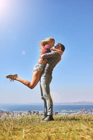 Youre the only one for me. Shot of an affectionate young couple enjoying a day outdoors.