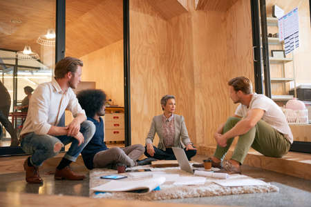 Furthering their lead in the industry through effective teamwork. Shot of a team of designers...