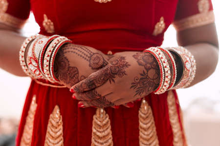 My beauty as a bride is in my henna. Cropped shot of an unrecognizable bride standing with mehendi...