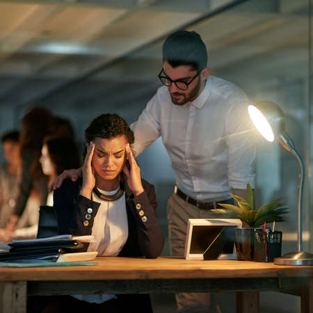 I just cant continue like this.... Cropped shot of a young businesswoman looking stressed out while...