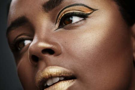 I hope you glow today. Cropped shot of a beautiful young woman wearing makeup.