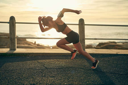 Racing teaches us to challenge ourselves. Shot of a young athlete taking off.