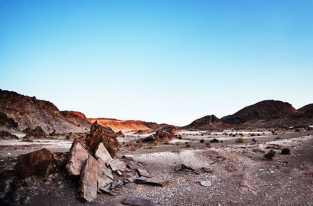 Its a vast and barren landscape. Shot of rugged desert terrain.の写真素材