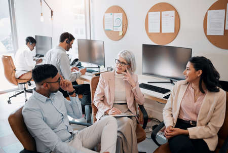 Make sure your ideas are heard. High angle shot of a diverse group of businesspeople sitting in the...