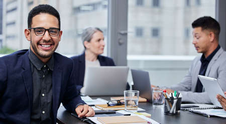 Weve been working on some solid strategies for success. Portrait of a young businessman having a...