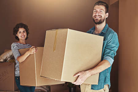 Weve saved long and hard for this day. Shot of a young couple moving into their new home.