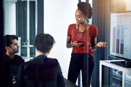 The numbers speak for themselves. Cropped shot of a young businesswoman giving a presentation in the...