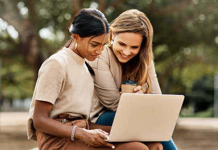 Smart is something you become not something you are. Shot of two attractive young female students...