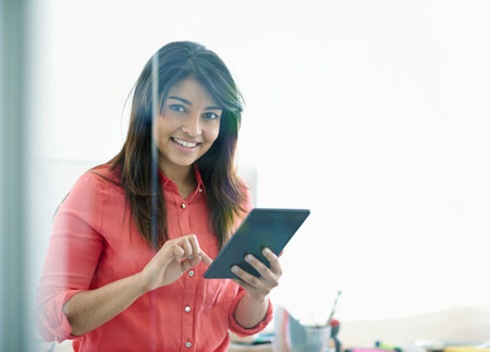 Creating a social media account for her businessの写真素材