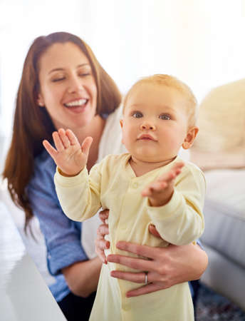 Thats my jam, mom. Shot of a mother spending time with her baby boy.の写真素材