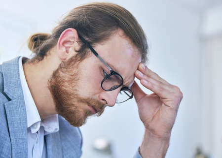 My whole day is ruined now. Closeup shot of a businessman looking stressed at work.