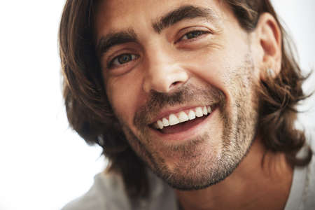 Its a great day to be happy. Shot of confident young man smiling at the camera.の写真素材