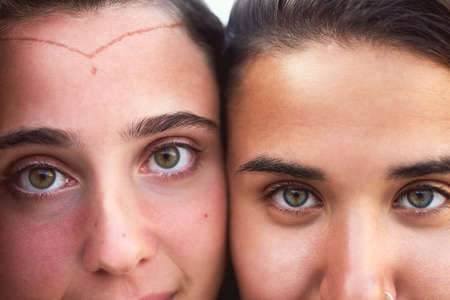 These eyes long to see the world. Closeup shot of girlfriends on vacation.の写真素材