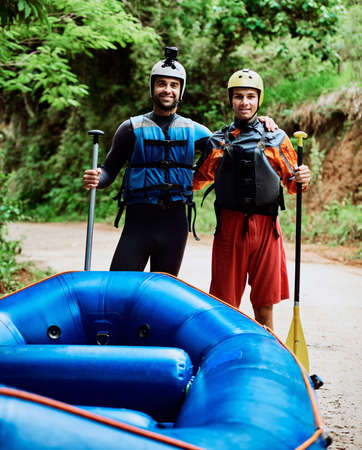 Weve been doing this since we were kids. Portrait of two cheerful young men wearing protective gear...