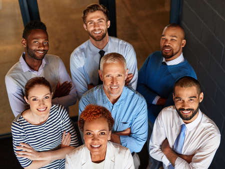 Theyre a team of achievers. High angle portrait of a diverse business team.の写真素材