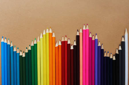 Be the reason someones life is full of colour. Studio shot of different coloured pencils against a...