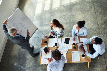 So this is where were at. High angle shot a mature businessman giving a presentation in the...