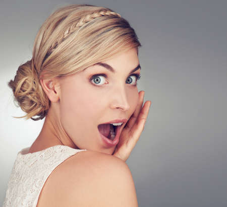 Surprised by modern beauty techniques. Portrait of a beautiful young woman looking surprised in...