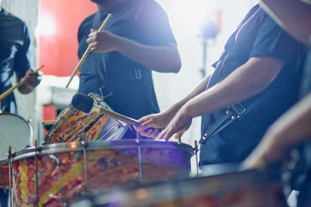 Getting into the groove. Shot of a group of musical performers playing together indoors.