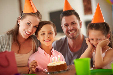 We love birthdays. Cropped shot of a family celebrating a birthday at home.