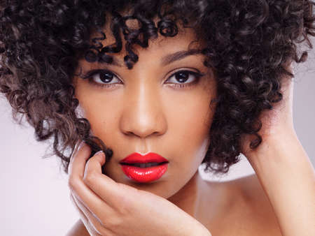 Theres nothing as good as healthy hair. Studio shot of a beautiful young woman against a gray...