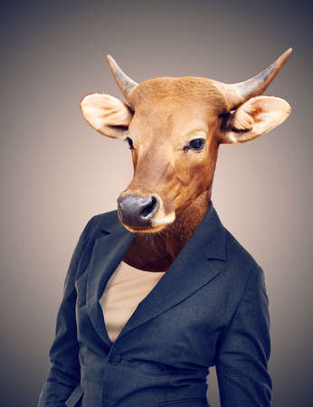 Welcome to the corporate jungle. Conceptual image of animal heads on business people.の写真素材