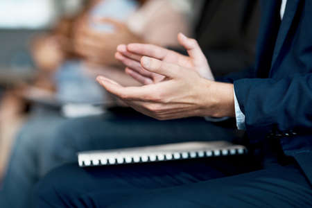 We dont need nothing but today. Cropped shot of an unrecognizable man clapping during a conference...
