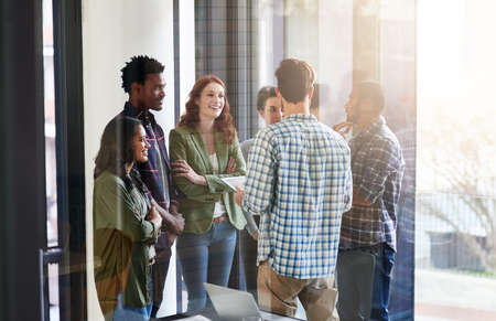 Theyre ready to soar to success. Shot of a group of colleagues having an office meeting.